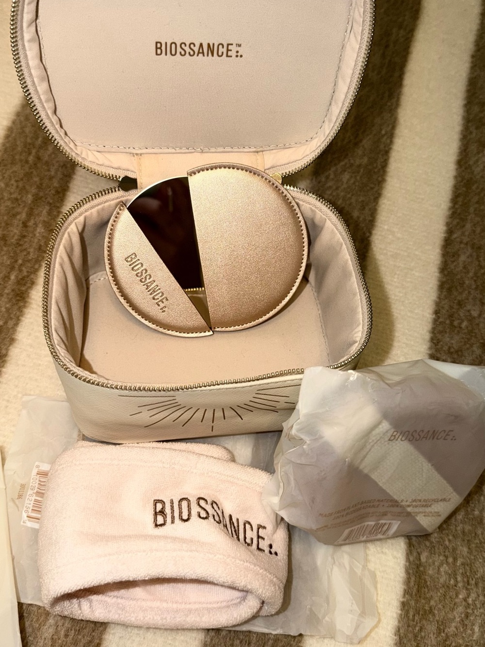Biossance Pink Travel Vanity Case with Skincare Accessories
